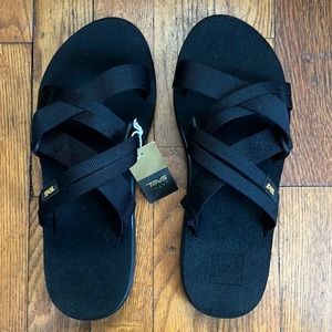 NWT Teva Voya Slide Black. Mush footbed, nylon webbing with crisscross style